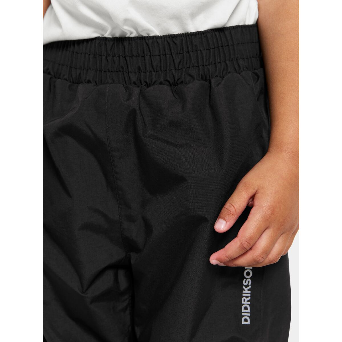 Didriksons Dětské nepromokavé kalhoty Idur black - ROSTOUCÍ