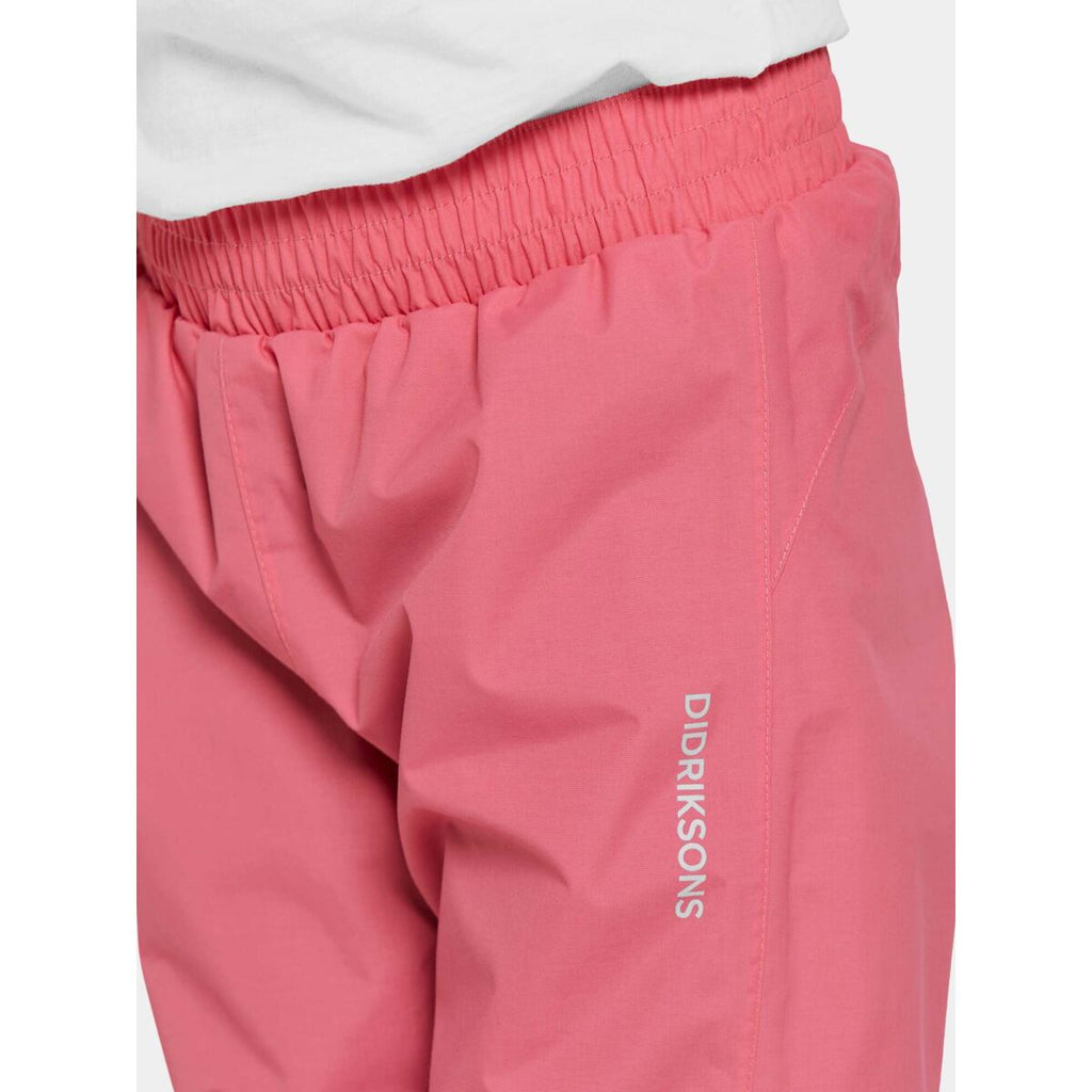Didriksons Dětské nepromokavé kalhoty Avan dusty azalea - ROSTOUCÍ
