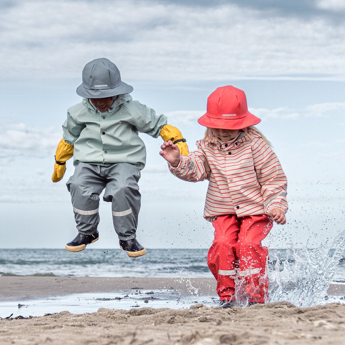 Didriksons Dětský klobouk do deště Southwest factory blue